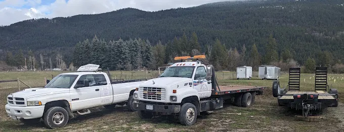 The truck and flatdeck trailer in the Creston area
