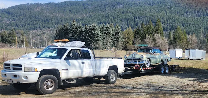 A classic car on the tilt deck